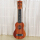 ミドルサイズの43.5 cmの円心ギター、桃木色